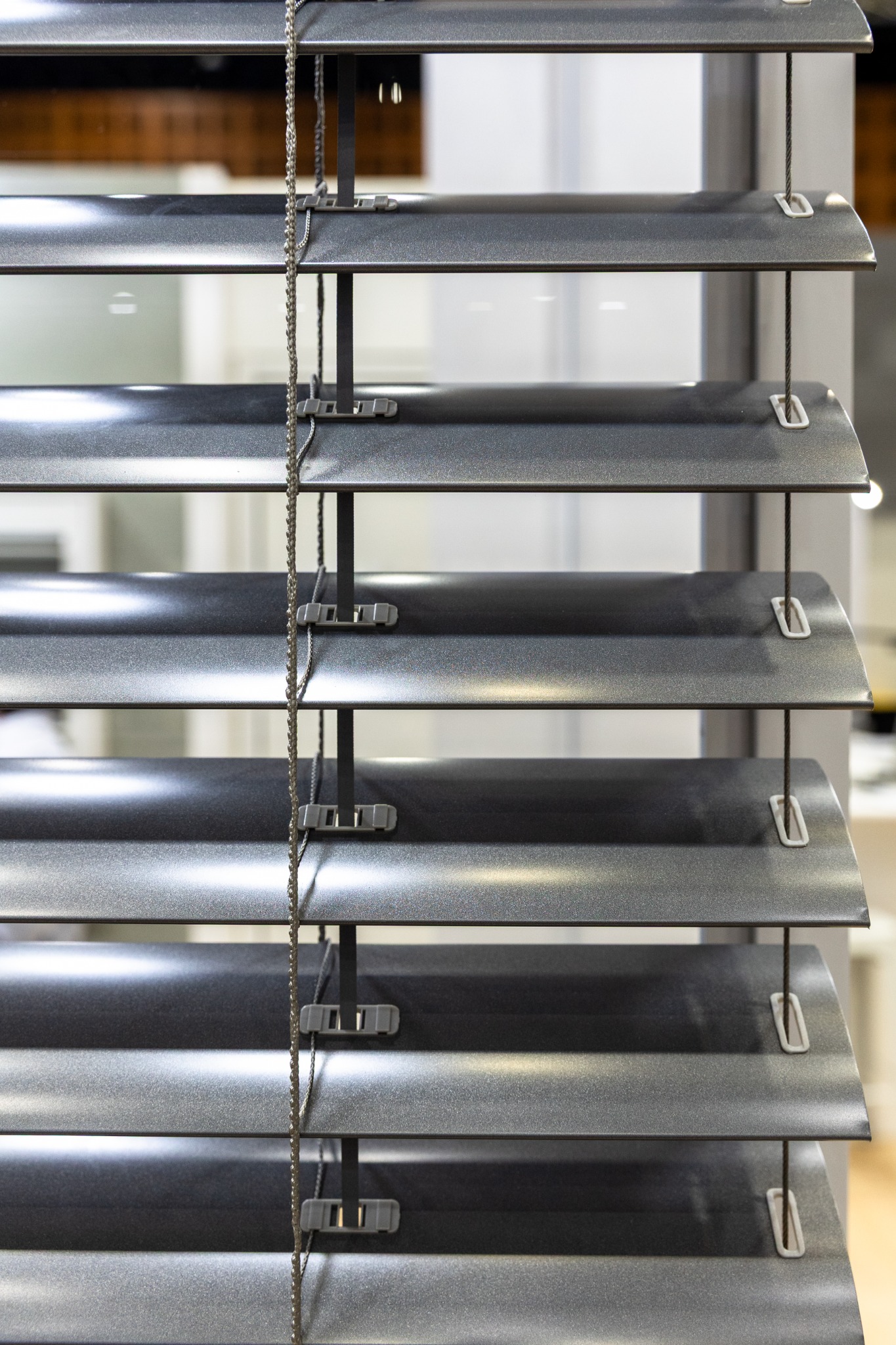 Open external aluminium venetian slats showing their adjustable form